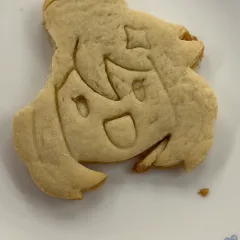 Paimon cookie with a bite taken out of it